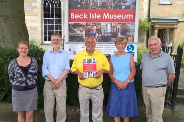 The Beck Isle Museum staff and volunteers with the new book.