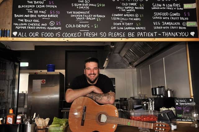 Tommy Taylor prepares for guests in his bar and restaurant in Filey