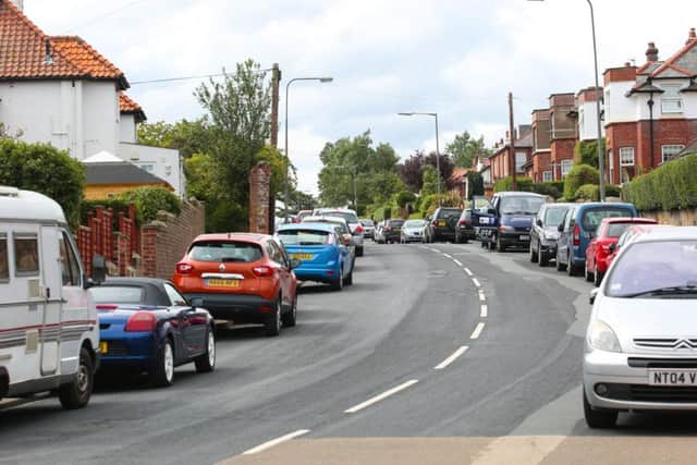 Cars parked on the pavement on the usually quiet Stakesby Road during Regatta. Monday 21 August. Whitby Regatta 2017. Picture: Ceri Oakes w173102t