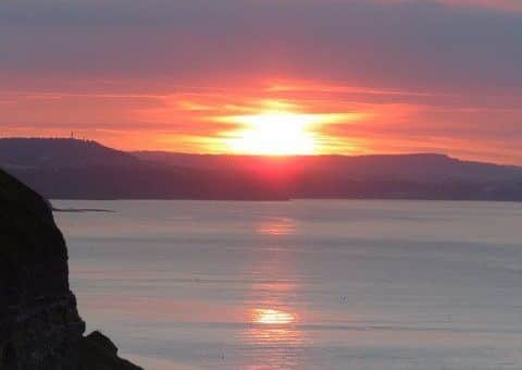 This wonderful photograph, capturing the beauty of the areas coastline in the evening, was taken by Julia West.