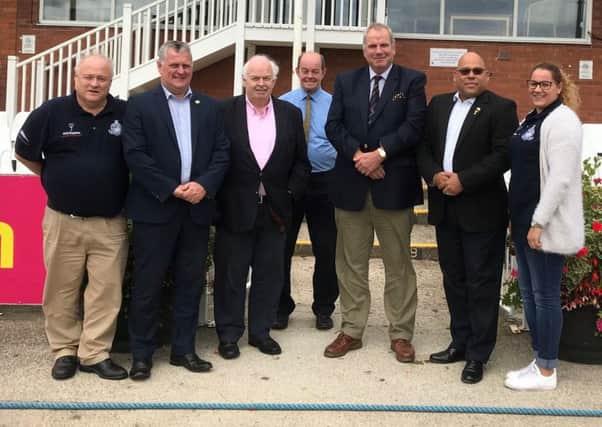 Guy Hewitt, second from right, is pictured at Scarboroughs North Marine Road cricket ground.