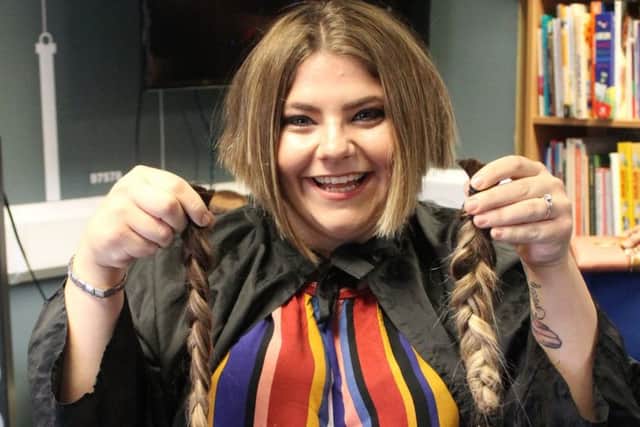 Kayleigh Woodward held a sponsored haircut to raise cash.