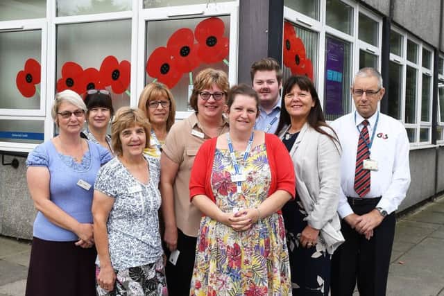 The team at Bridlington JobCentre with their poppies.