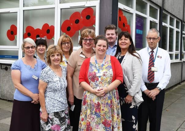 The team at Bridlington JobCentre with their poppies.