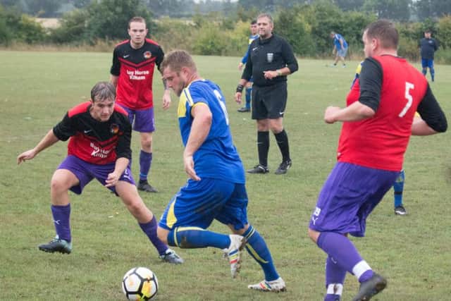 Seamer player-boss Tommy Adams goes on the attack against Goal Sports. Picture by Steve Lilly.