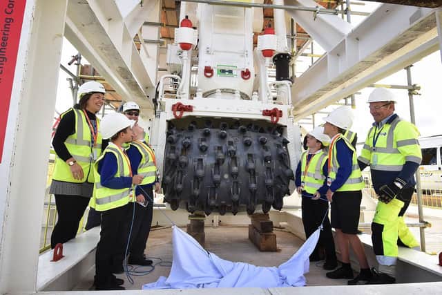 Children from Sleights Primary School unveil the new vertical shaft sinking machine at the Woodsmith Mine Site