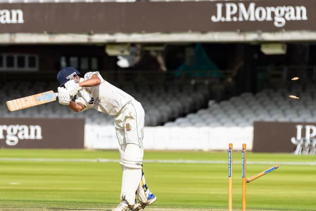 Will Hutchinson is bowled for 48 in Flixton's Cricketer National Village Cup final at Lord's. Picture by Will Palmer.