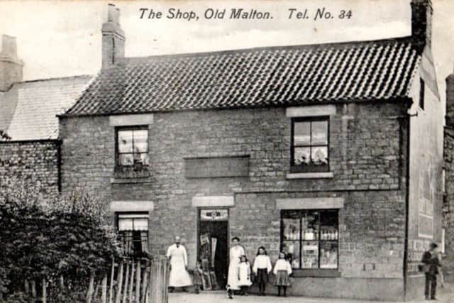 The Wood family stand proudly outside their shop in Old Malton.