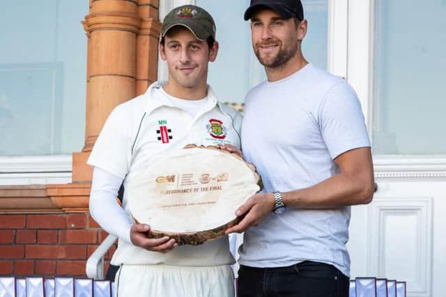 Middlesex and Englands Dawid Malan hands over an award to Matt Nesfield. Picture by Will Palmer.