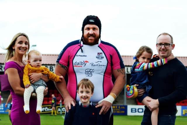 Daisy Fitzpatrick with mum Ellie and dad Neil with brother Charlie and sister Rosie, with Scarborough RUFC skipper Matty Jones (right)