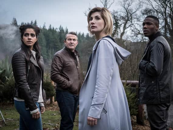 Jodie Whittaker as Doctor Who and her assistants Mandip Gill, Bradley Walsh and Tosin Cole.