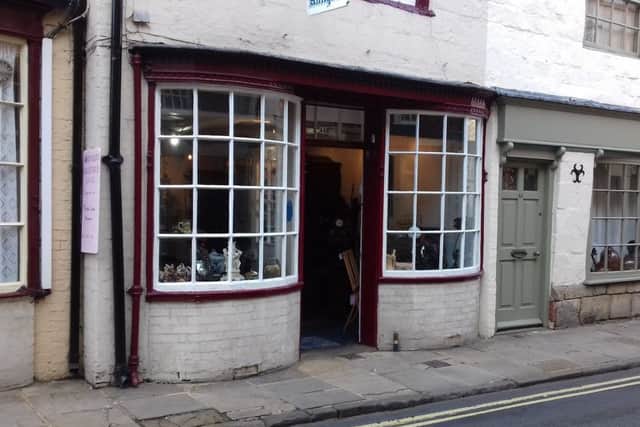 Michael James Antiques, owned by Michael James Collins, on High Street in the Old Town.