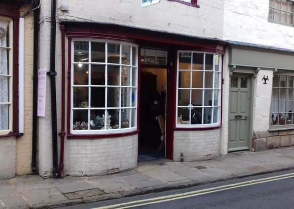 Michael James Antiques, owned by Michael James Collins, on High Street in the Old Town.