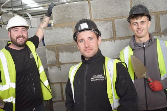 Lewis Weller, Kyle May and Kai Ellis pictured in Scarborough TECs new Engineering & Construction Centre.