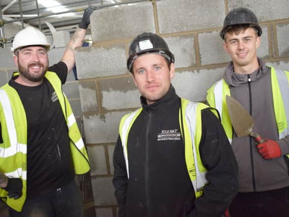 Lewis Weller, Kyle May and Kai Ellis pictured in Scarborough TECs new Engineering & Construction Centre.