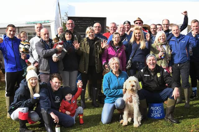 Organisers Lisa Rowett-Smith and Graham Smith cheer with fundraisers. Picture by Richard Ponter - 184329j