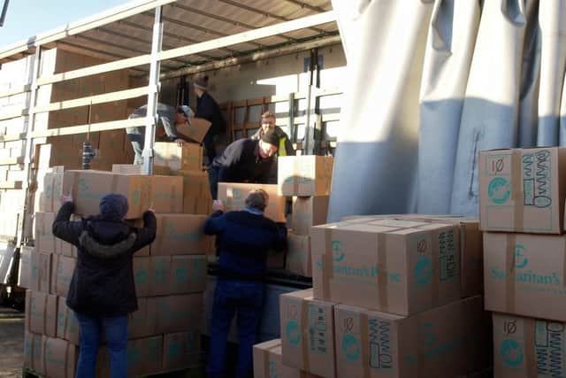 Operation Christmas Child shoeboxes are loaded onto a lorry during last years operation at Scarborough.