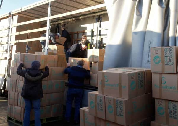 Operation Christmas Child shoeboxes are loaded onto a lorry during last years operation at Scarborough.