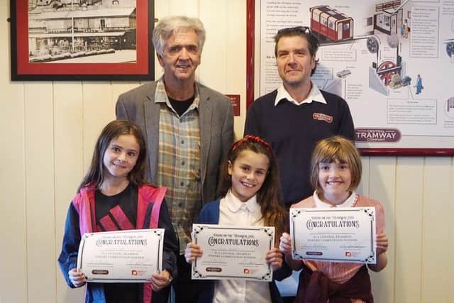 The Central Tramway Childrens Poetry Competition winners with their prizes.