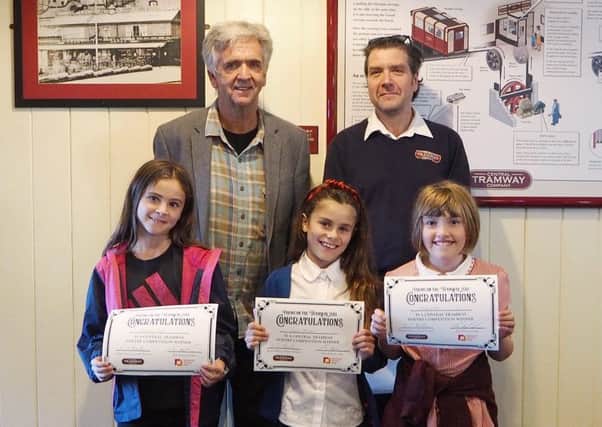 The Central Tramway Childrens Poetry Competition winners with their prizes.