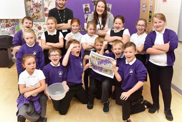 Barrowcliff School start their Bake off challenge with staff Adam Lewis and Jess Hardisty. Picture by Richard Ponter