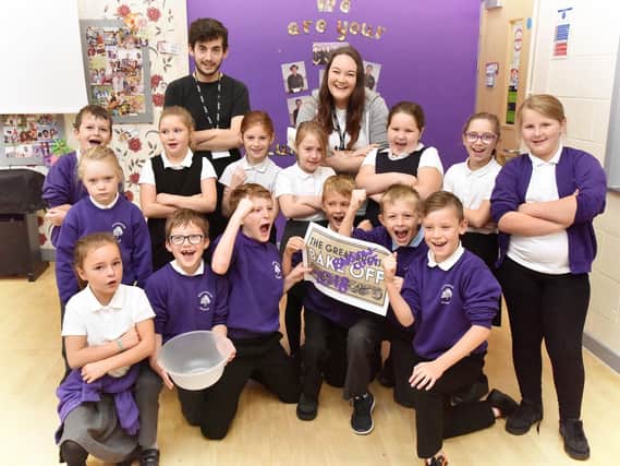 Barrowcliff School start their Bake off challenge with staff Adam Lewis and Jess Hardisty. Picture by Richard Ponter