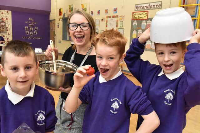 Barrowcliff School start their Bake off challenge with staff member Laura Pilkington with, Ronnie Noah and Alex. Picture by Richard Ponter