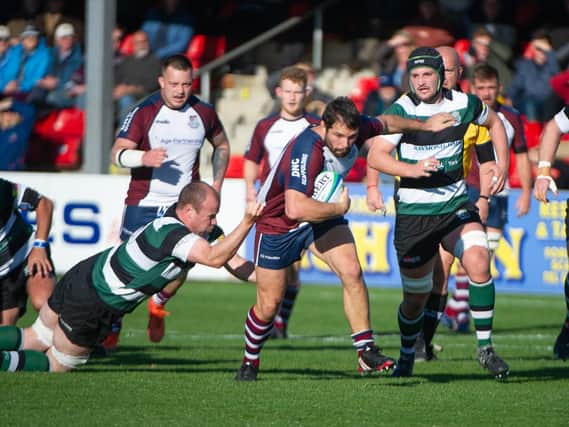 Alexis Core on his way to scoring a try for Scarborough against York