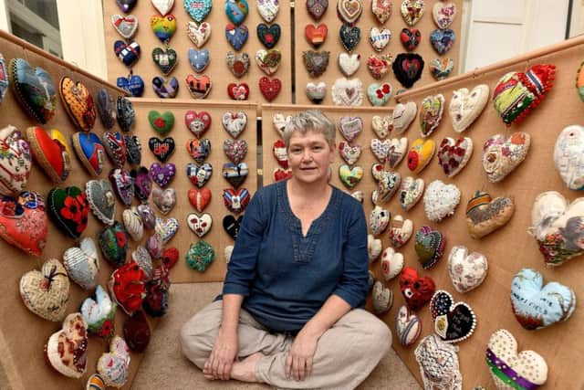 Helen Birmingham takes a break from her sawdust hearts project. Picture: Richard Ponter.