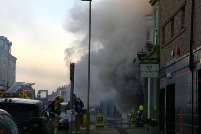 Firefighters tackle the blaze at Hanover Road fish and chips. Picture by Allan Charter