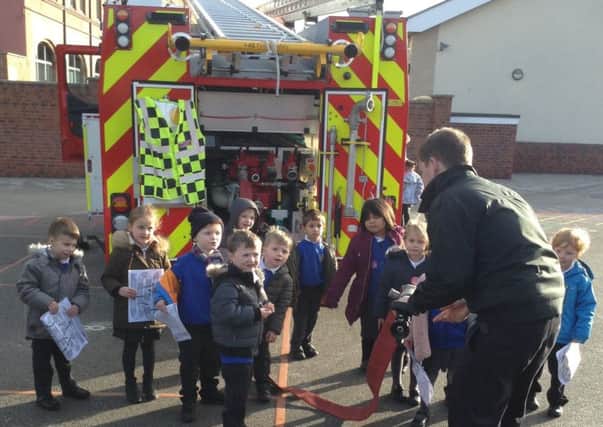 Firefighters make a special visit to Gladstone Road Primary School.