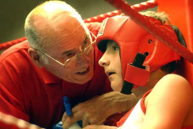 Scarborough Amateur Boxing Club coach Tommy Johnson, who passed away at the age of 85, issuing instructions to one of his many young fighters