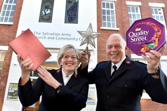 Captain Angela Noble and Major Steve Noble are getting ready to prepare their Christmas meal