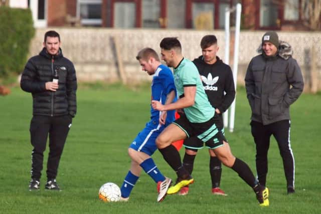 Eastfield Athletic and Itis Itis Rovers in action. Pictures by Steve Lilly.