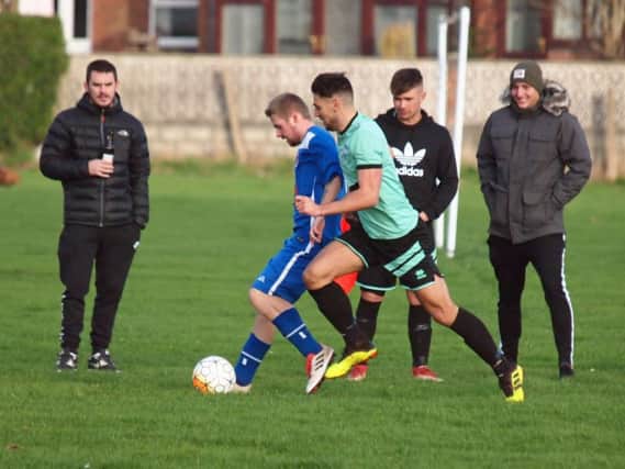 Eastfield Athletic and Itis Itis Rovers in action. Pictures by Steve Lilly.