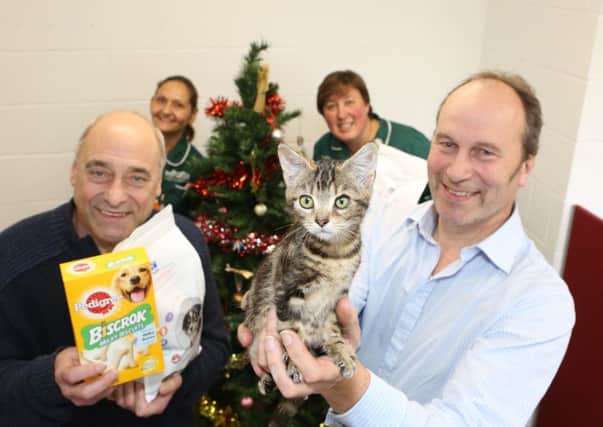 Mount Veterinary Group representatives with Ryedale Foodbanks John Mackenzie (left).