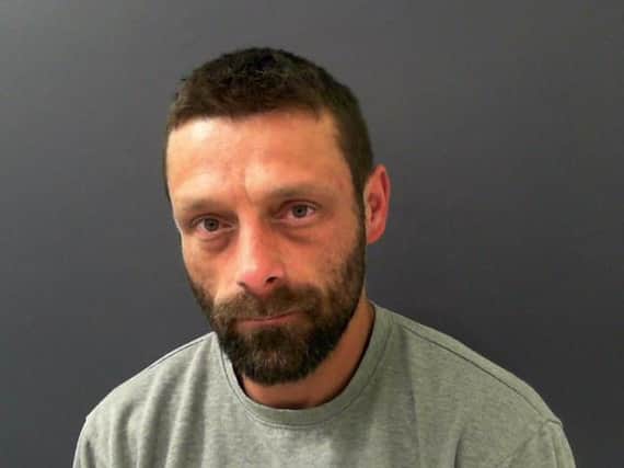 Shane Hughes, 41, from Halifax, led officers on a chase for 37 miles before abandoning the decommissioned ambulance he was driving on the railway tracks at Kildwick, North Yorkshire, on 13 July.