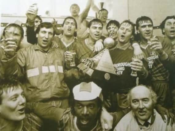 Neil Warnock celebrates promotion with Scarborough FC