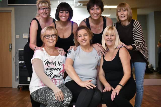 Some of the ladies taking part in the charity Half Monty. Breast cancer survivors, from left, back, Jo Laking, Elaine Cunnington, Sharon Horner and Mags Salt. Front, Carol Raper Williamson, Lisa Smith and Tracy Smith. Picture by Richard Ponter 184718e