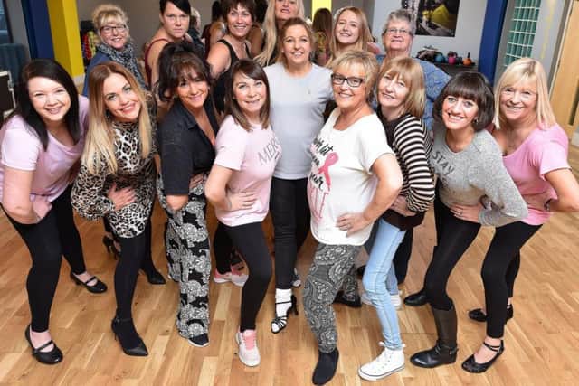 Cayton ladies go through their routine ready for a charity ' half monty' in aid of supporting breast cancer. Picture by Richard Ponter 184717c