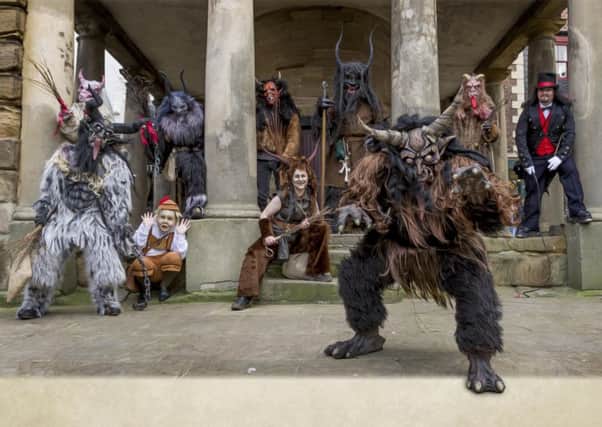 Krampus Run characters in the Market Place, Whitby.