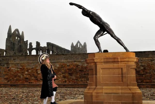 © Tony Bartholomew Whitby Re-enactor Harry Collett dressed as Sir Hugh Cholmley, the man who brought the original Borghese Gladiator statue to his Whitby home with a recreation which has been forged by Rupert Harris of London and brought back to its site in front of the Banqueting House at Whitby Abbey.