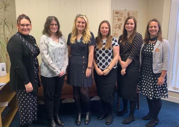 Staff at North Yorkshire Law in their spotty outfits.