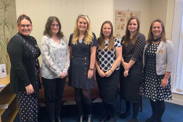 Staff at North Yorkshire Law in their spotty outfits.