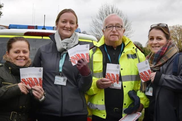 Officers and charity workers visit the community to offer advice.