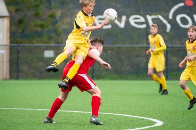 Boro Under-13s and Brid battle for possession