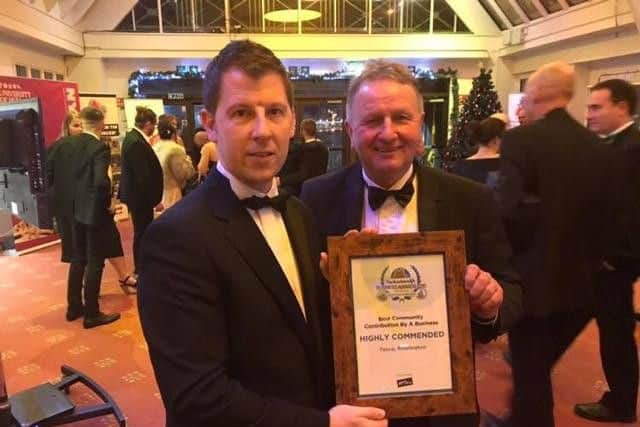 Giles Baugh and Donovan Copley from Tesco Bridlington with their highly commended certificate.