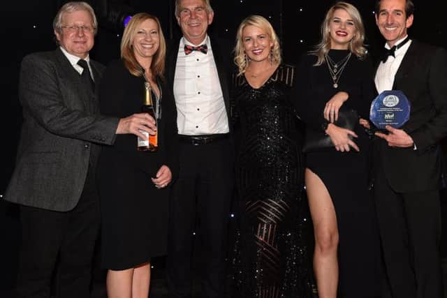 The team from Bridlington Dental Studio with award sponsor Chris West.