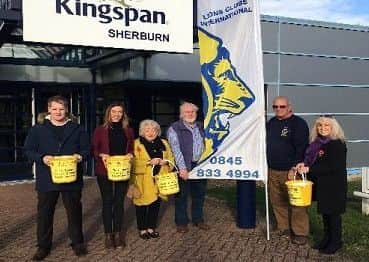 Collecting for the Lions Club.