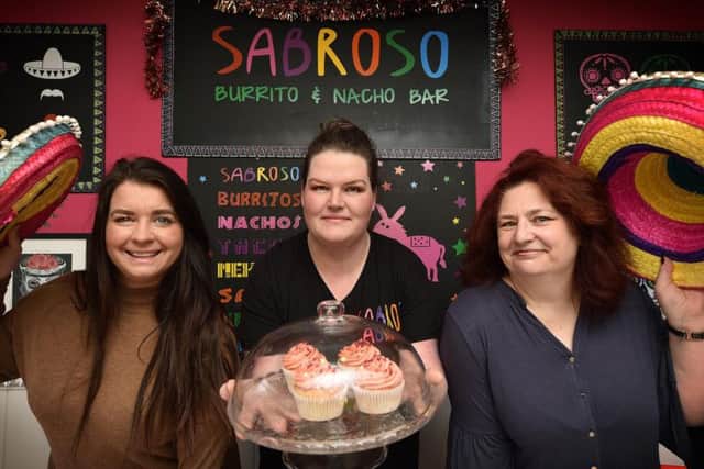 Scarborough love local shopping...Organiser Jennefer Crowther, Sabroso owner Heather Smedley, supporter Joanne Greenwood.